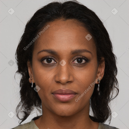 Joyful black young-adult female with medium  brown hair and brown eyes