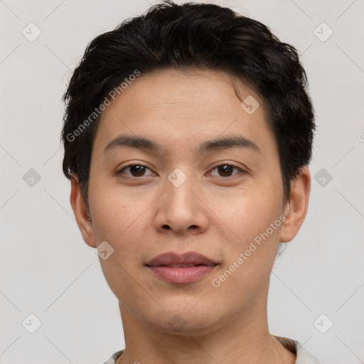 Joyful asian young-adult male with short  black hair and brown eyes