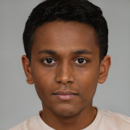 Neutral black young-adult male with short  brown hair and brown eyes