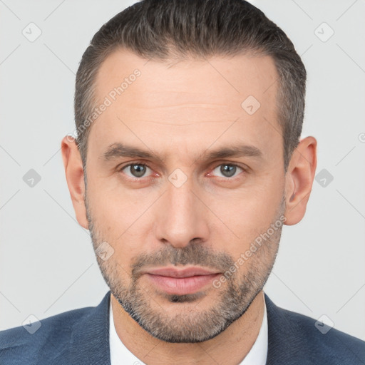 Neutral white adult male with short  brown hair and brown eyes