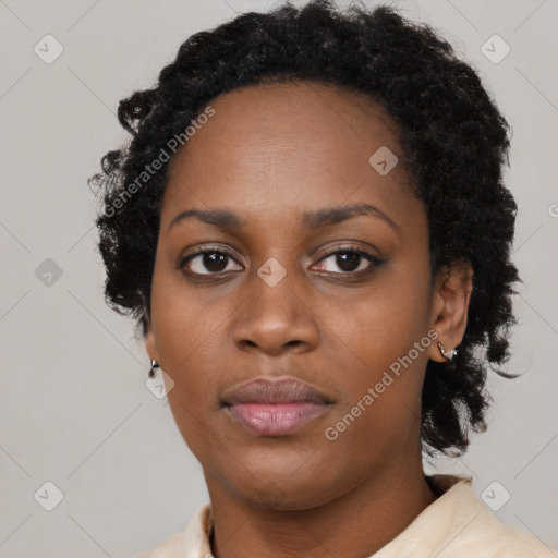 Neutral black young-adult female with medium  brown hair and brown eyes