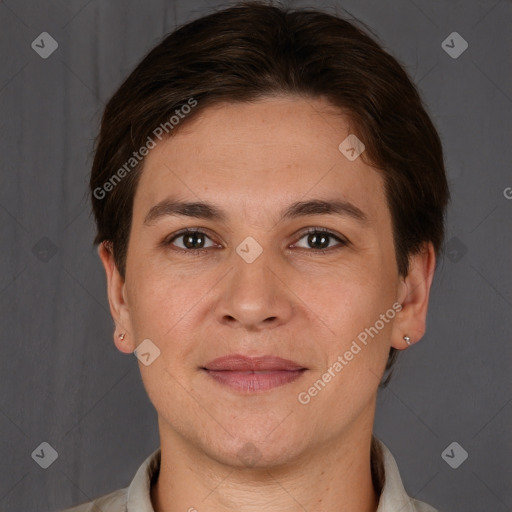 Joyful white adult male with short  brown hair and brown eyes