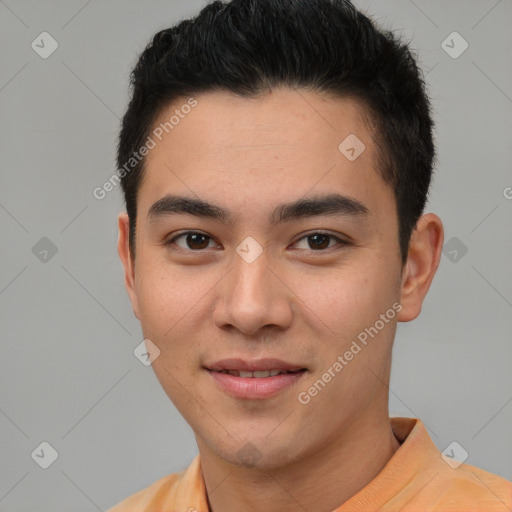 Joyful latino young-adult male with short  brown hair and brown eyes