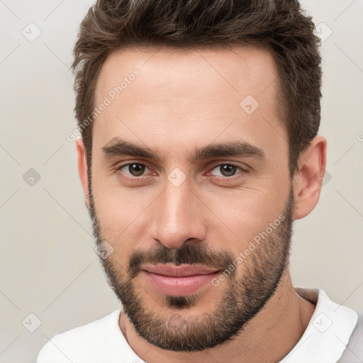 Joyful white young-adult male with short  brown hair and brown eyes