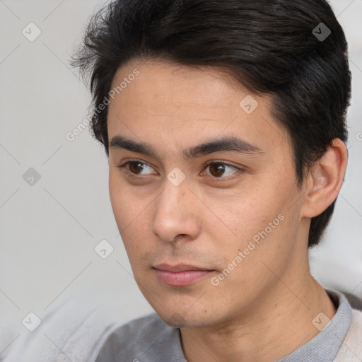 Neutral white young-adult male with short  black hair and brown eyes