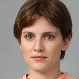 Neutral white young-adult female with medium  brown hair and grey eyes