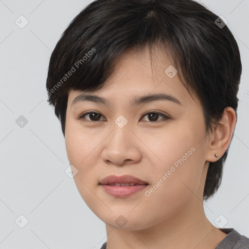 Joyful asian young-adult female with medium  brown hair and brown eyes