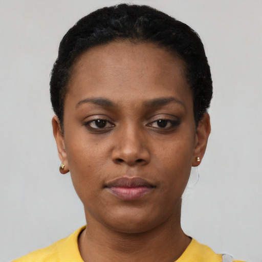 Neutral black young-adult female with short  black hair and brown eyes