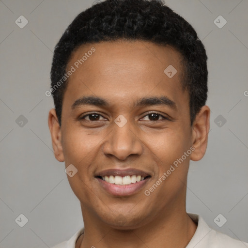 Joyful black young-adult male with short  black hair and brown eyes