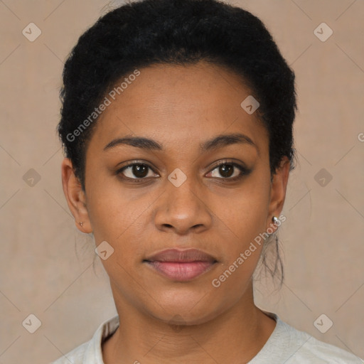 Joyful black young-adult female with short  black hair and brown eyes