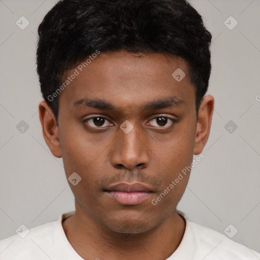 Neutral black young-adult male with short  brown hair and brown eyes