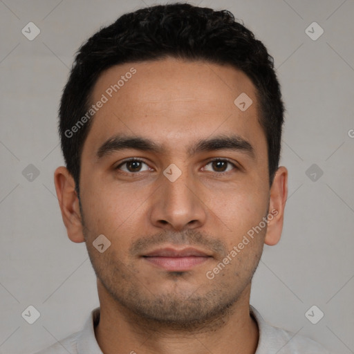 Neutral white young-adult male with short  black hair and brown eyes