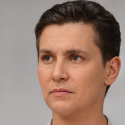 Neutral white adult male with short  brown hair and brown eyes