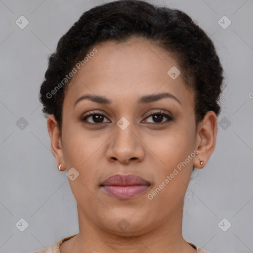 Joyful latino young-adult female with short  brown hair and brown eyes