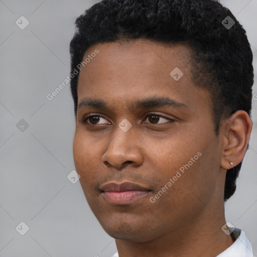 Neutral black young-adult male with short  black hair and brown eyes