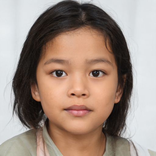 Neutral asian child female with medium  brown hair and brown eyes