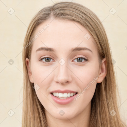 Joyful white young-adult female with long  brown hair and grey eyes