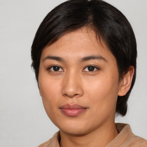 Neutral white young-adult female with medium  brown hair and brown eyes