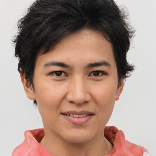 Joyful asian young-adult female with short  brown hair and brown eyes