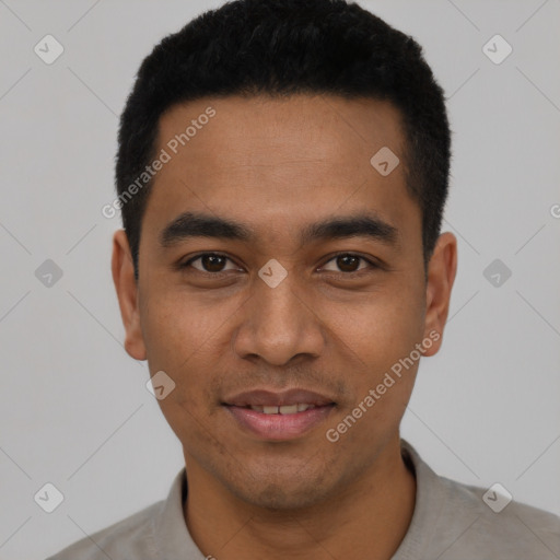Joyful latino young-adult male with short  black hair and brown eyes