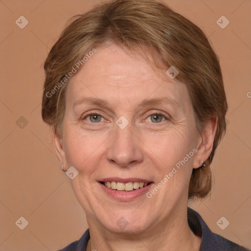 Joyful white adult female with medium  brown hair and grey eyes