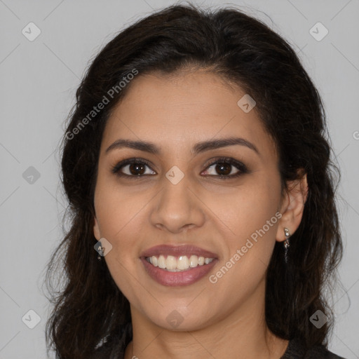 Joyful latino young-adult female with long  brown hair and brown eyes