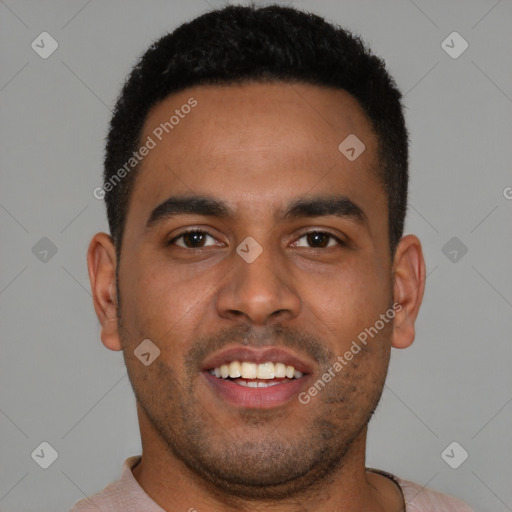Joyful black young-adult male with short  brown hair and brown eyes
