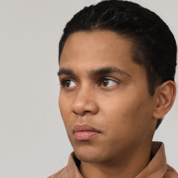 Neutral latino young-adult male with short  black hair and brown eyes