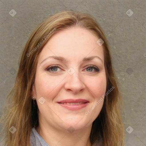 Joyful white adult female with long  brown hair and brown eyes