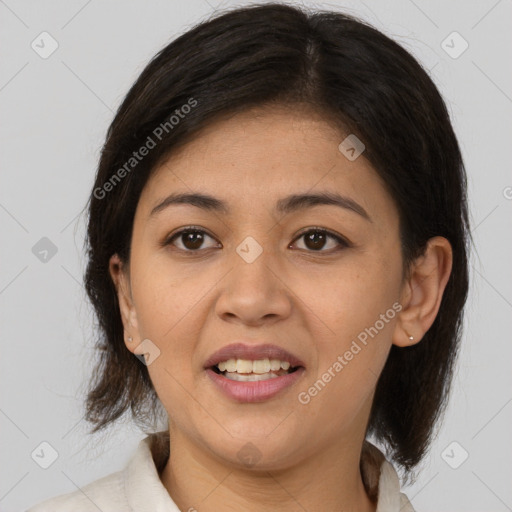 Joyful latino young-adult female with medium  brown hair and brown eyes