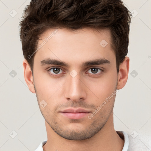 Neutral white young-adult male with short  brown hair and brown eyes