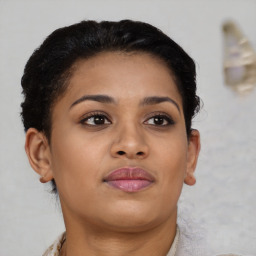 Neutral black young-adult female with short  brown hair and brown eyes