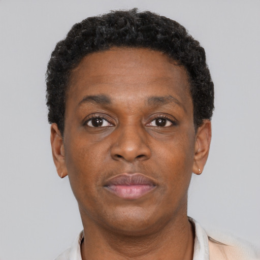 Neutral black adult female with short  brown hair and brown eyes