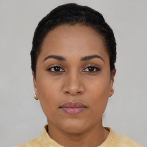 Neutral latino young-adult female with short  black hair and brown eyes
