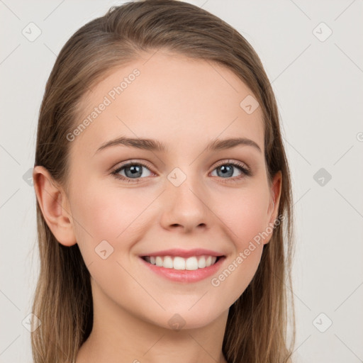 Joyful white young-adult female with long  brown hair and grey eyes