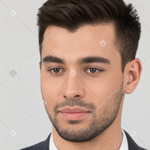 Neutral white young-adult male with short  brown hair and brown eyes