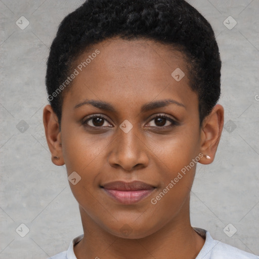 Joyful black young-adult female with short  brown hair and brown eyes