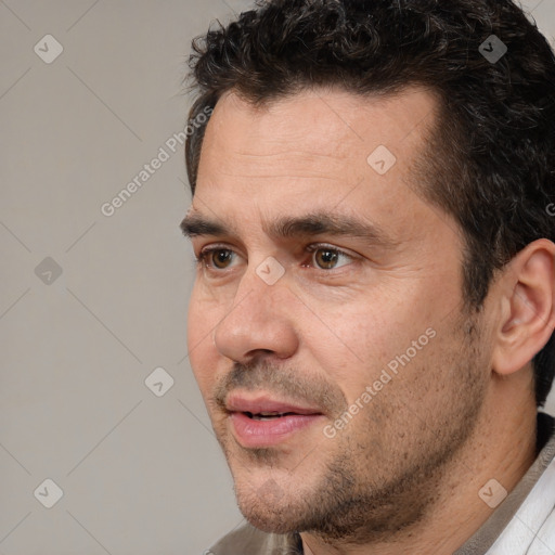 Neutral white adult male with short  brown hair and brown eyes