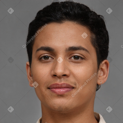 Joyful latino young-adult female with short  black hair and brown eyes