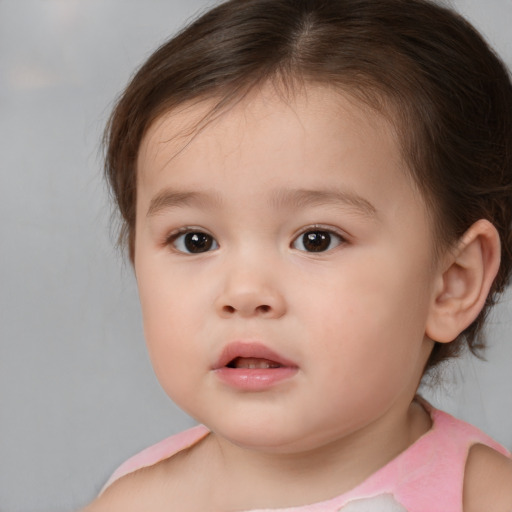 Neutral white child female with medium  brown hair and brown eyes