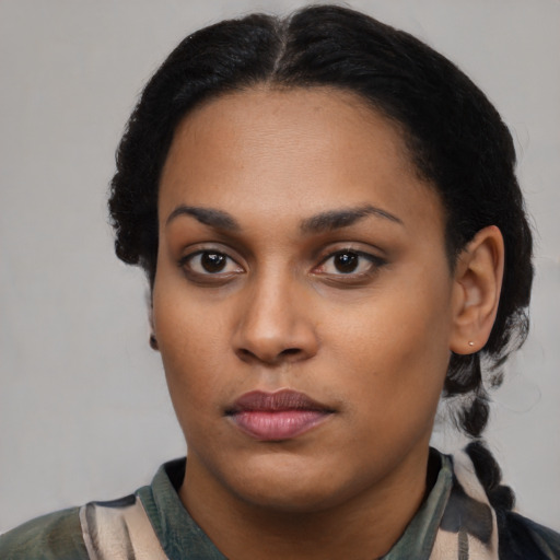 Neutral black young-adult female with medium  black hair and brown eyes