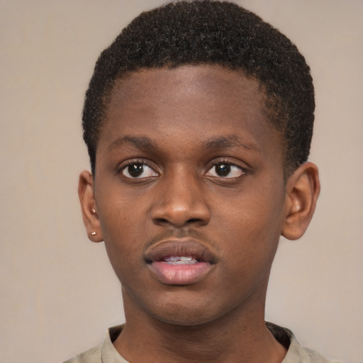Neutral black child male with short  brown hair and brown eyes