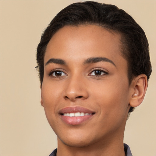 Joyful latino young-adult female with short  brown hair and brown eyes