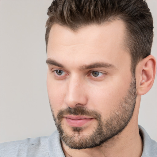 Neutral white young-adult male with short  brown hair and brown eyes