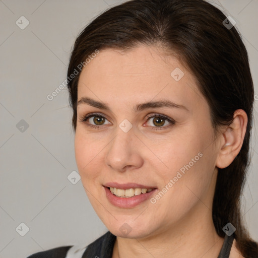 Joyful white young-adult female with medium  brown hair and brown eyes