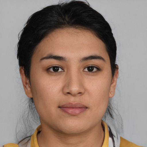 Joyful asian young-adult female with medium  brown hair and brown eyes