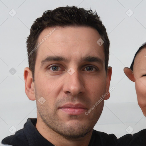 Neutral white young-adult male with short  brown hair and brown eyes