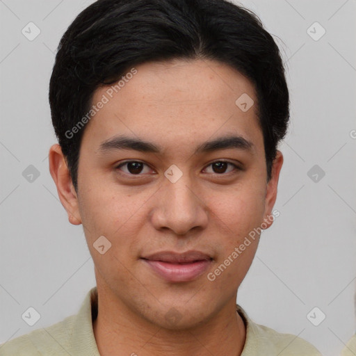 Joyful asian young-adult male with short  black hair and brown eyes