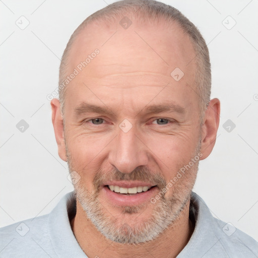 Joyful white middle-aged male with short  brown hair and brown eyes