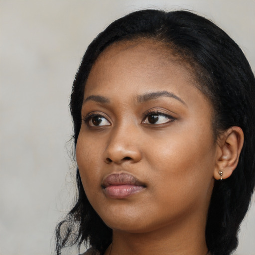 Neutral black young-adult female with long  black hair and brown eyes